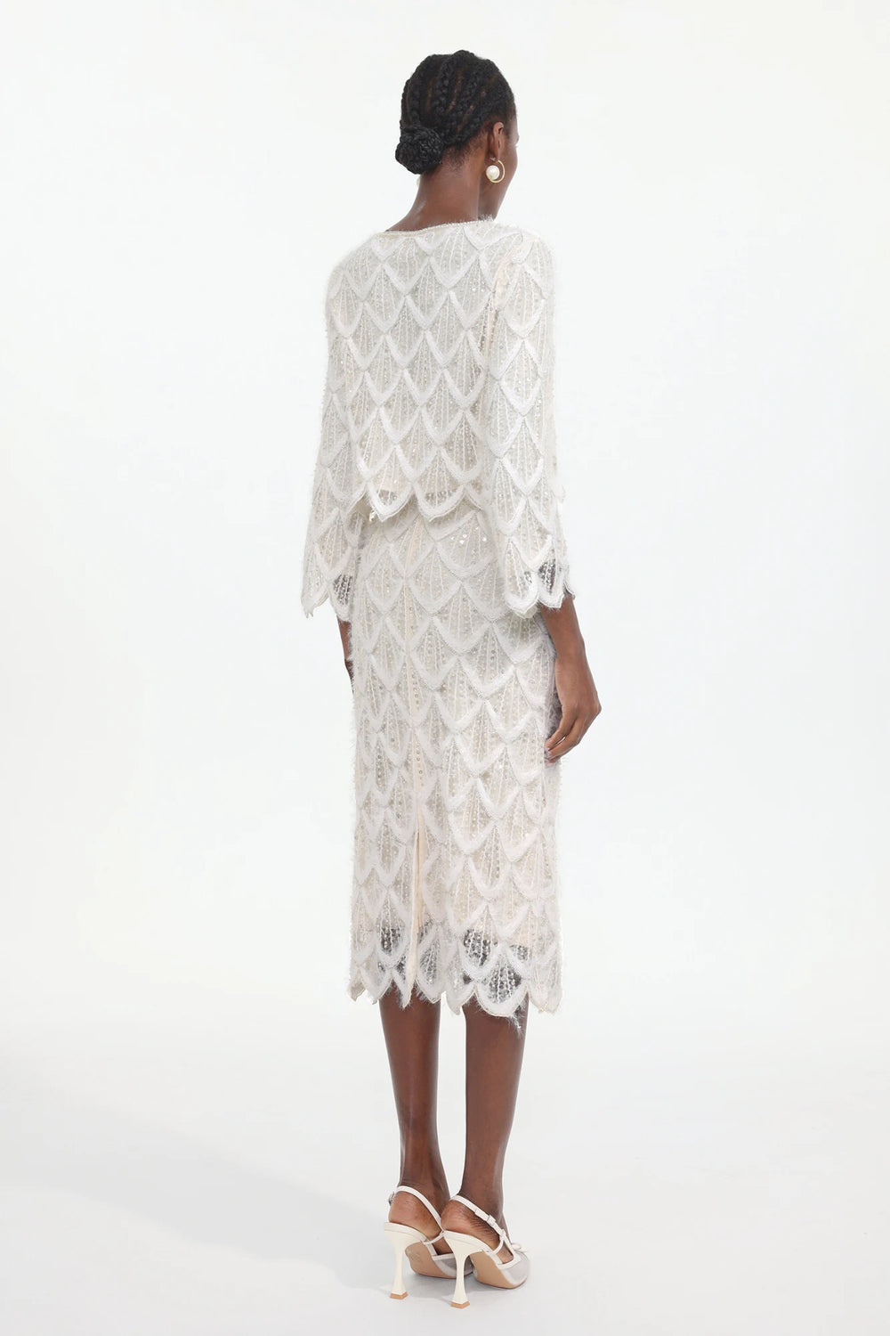 Back view of lace dress and jacket set with scalloped hem