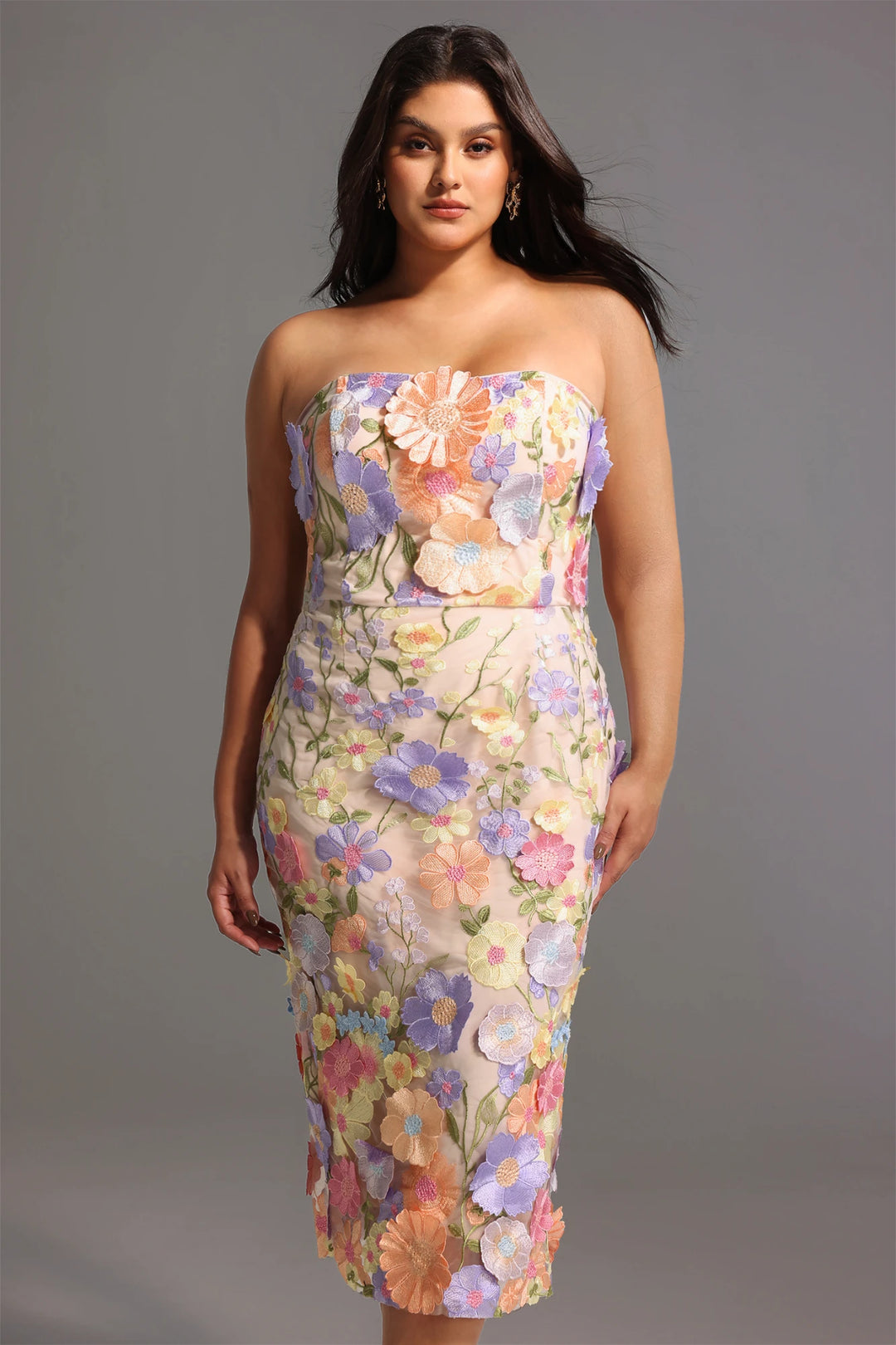 Strapless embroidered dress model pose studio