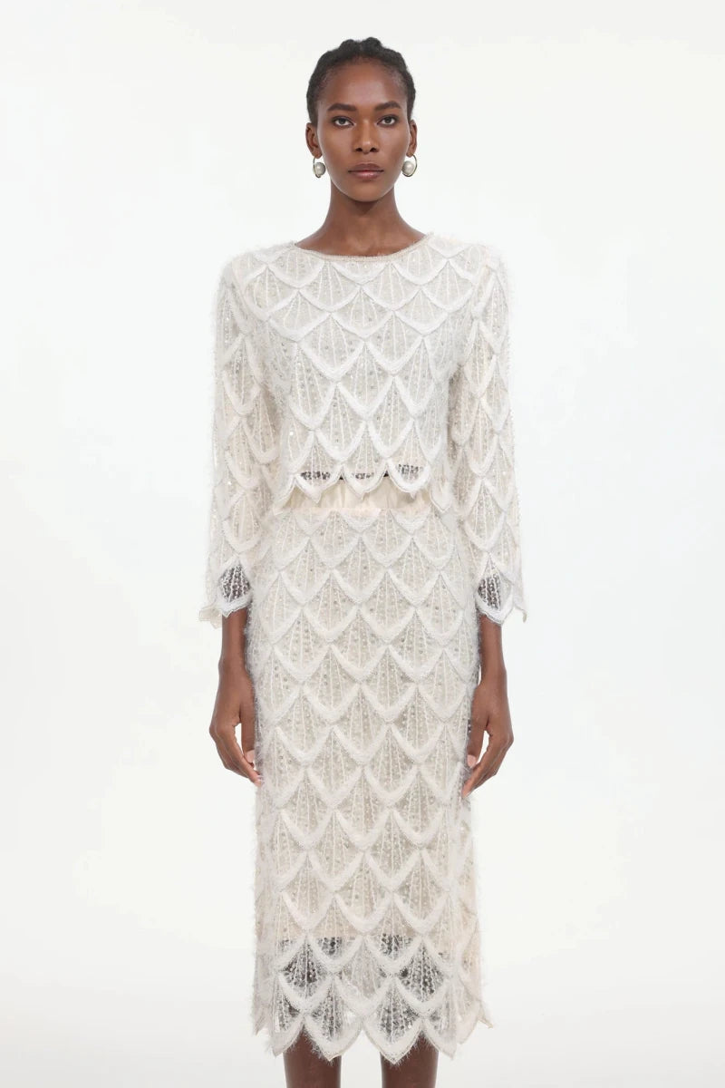 Full length lace dress and jacket set showing fitted silhouette