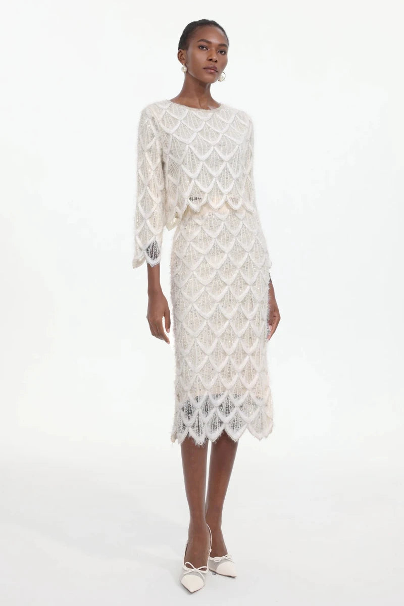 Side angle of beaded lace midi dress with matching jacket