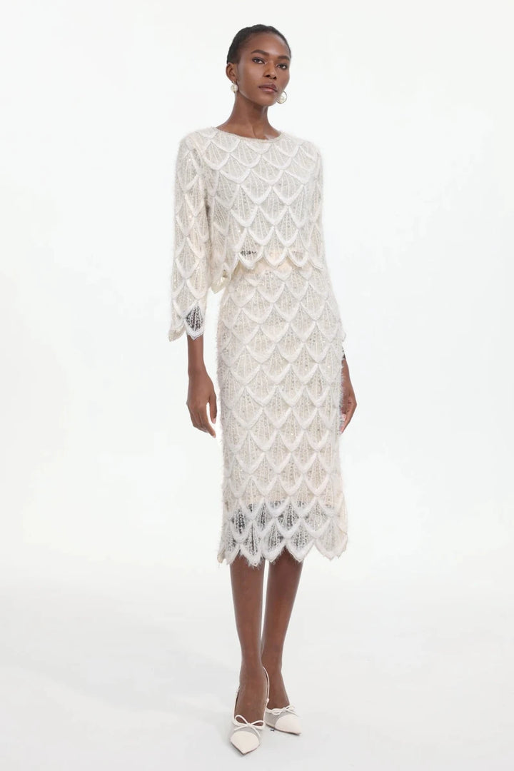 Side angle of beaded lace midi dress with matching jacket