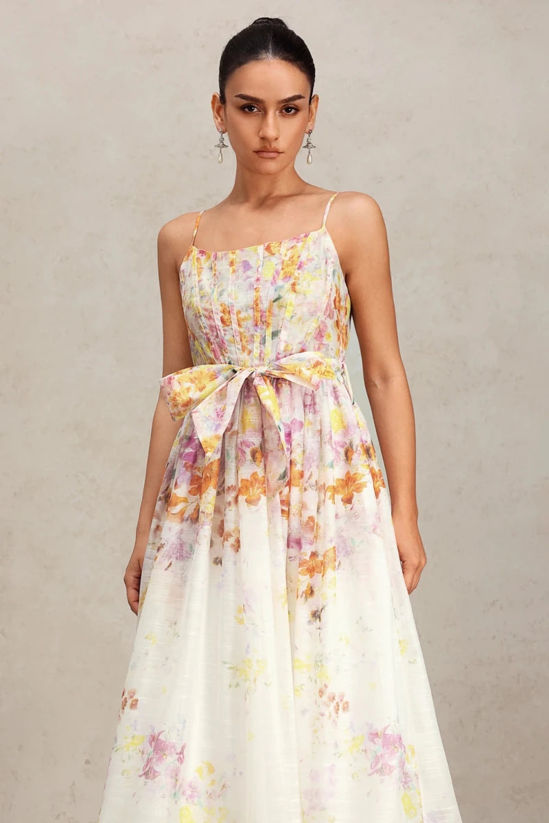 Floral A-line midi dress front view with bow waist detail