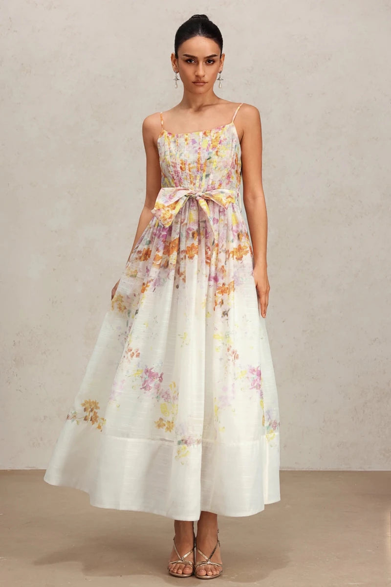 Floral A-line midi dress front view with bow waist detail