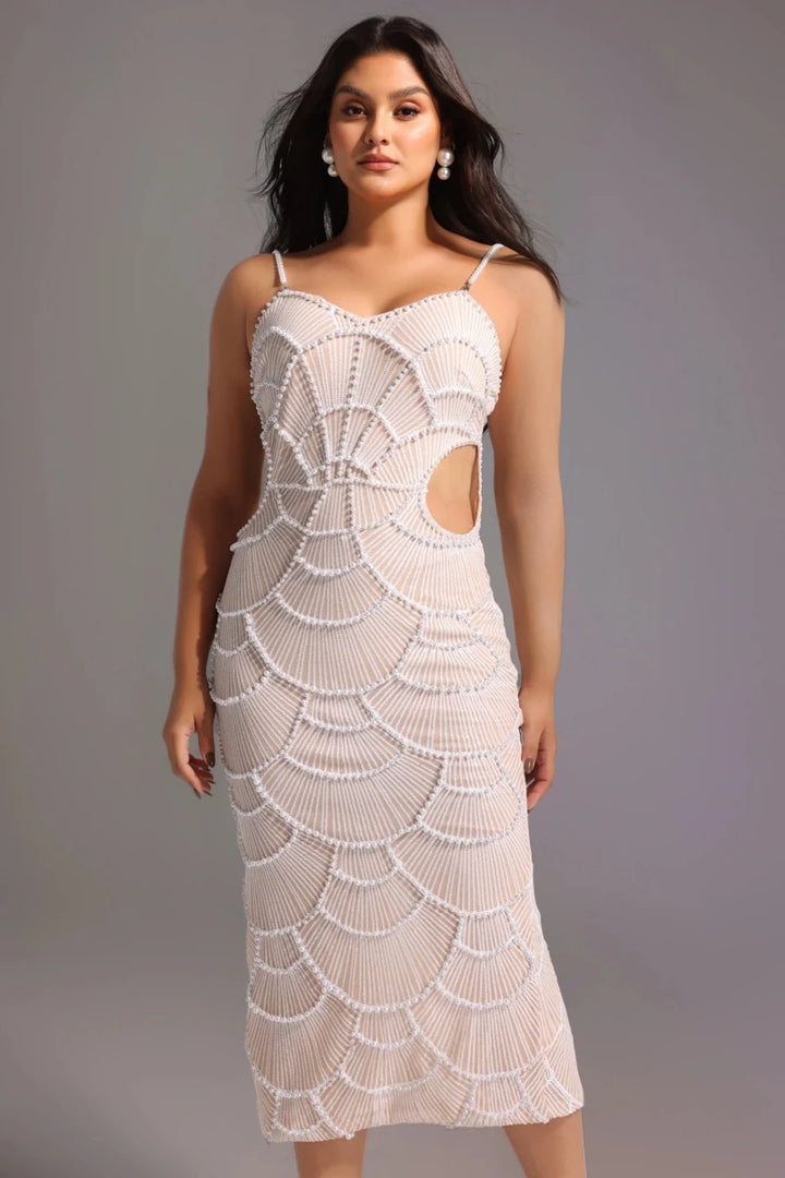 Ivory occasion dress with geometric beaded pattern