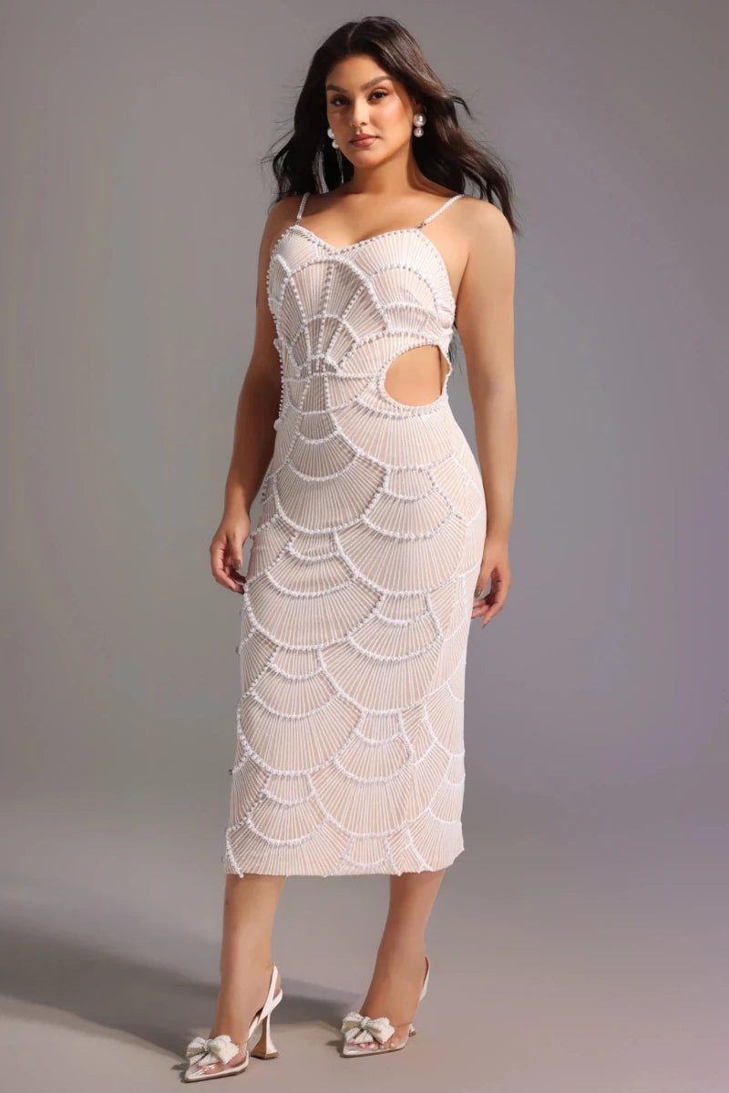 Side angle of ivory fitted beaded midi dress